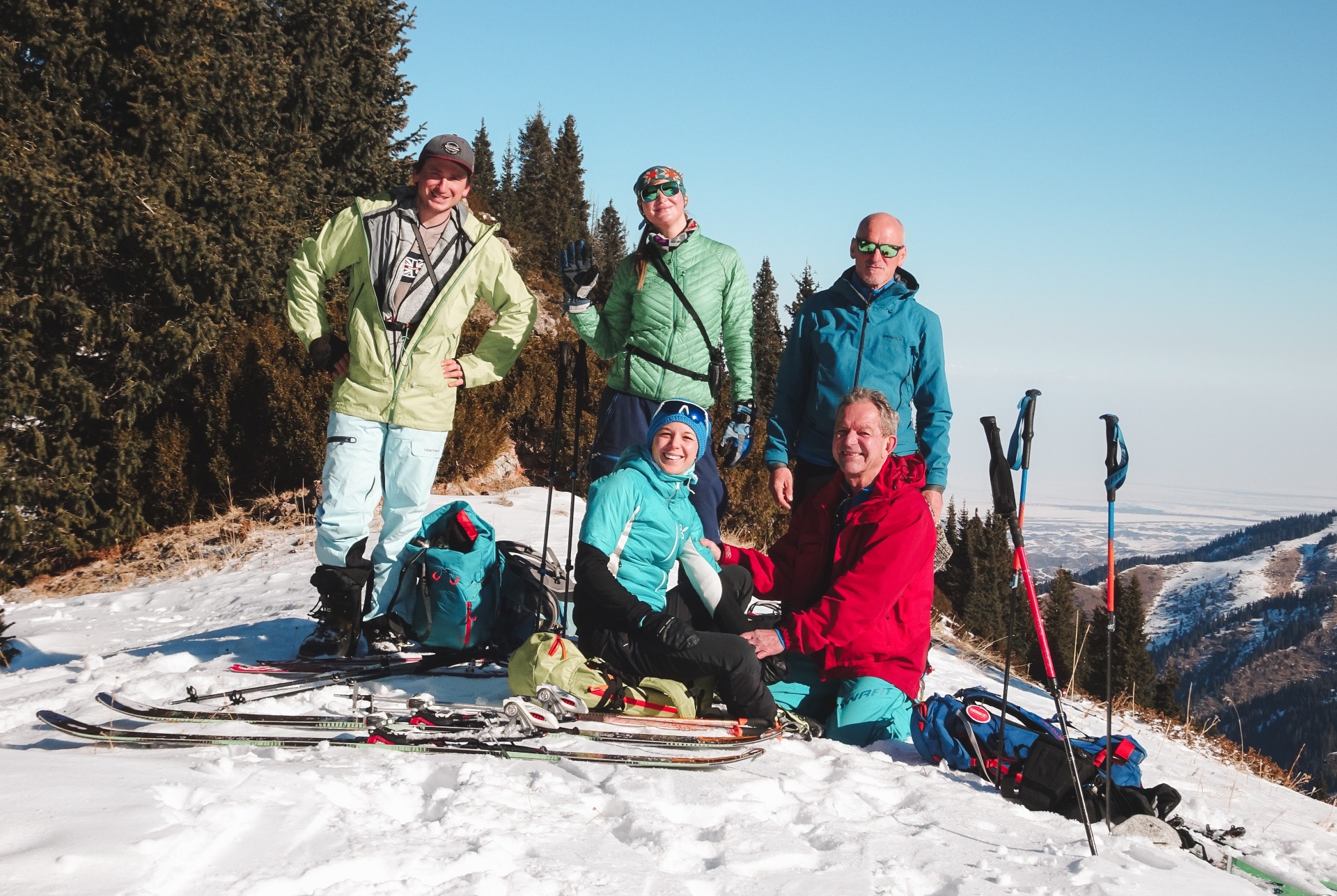 group of skiers on the top of the mountain in Ketmen gorge