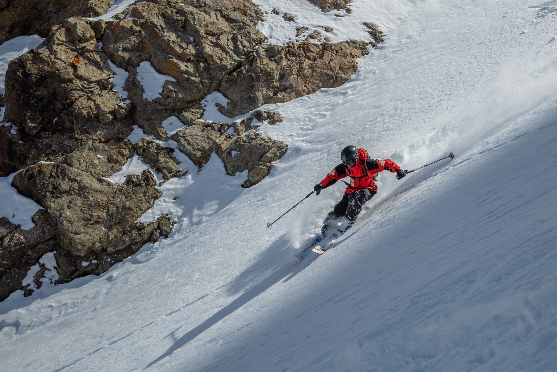 guide leading on a freeride in the couloir in Shymbulak