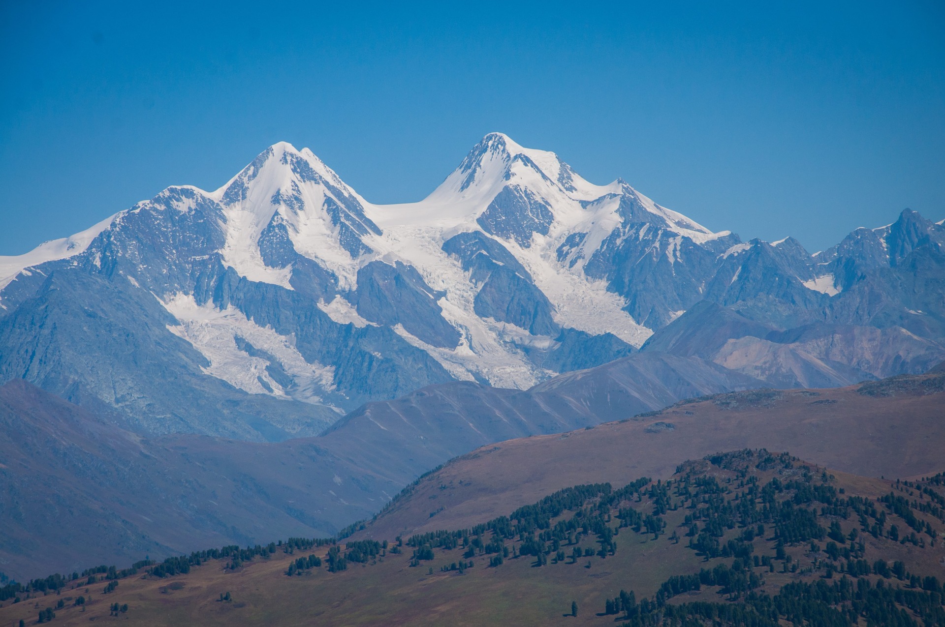 Hiking with a Belukha mountain view in the Altai in Kazakhstan