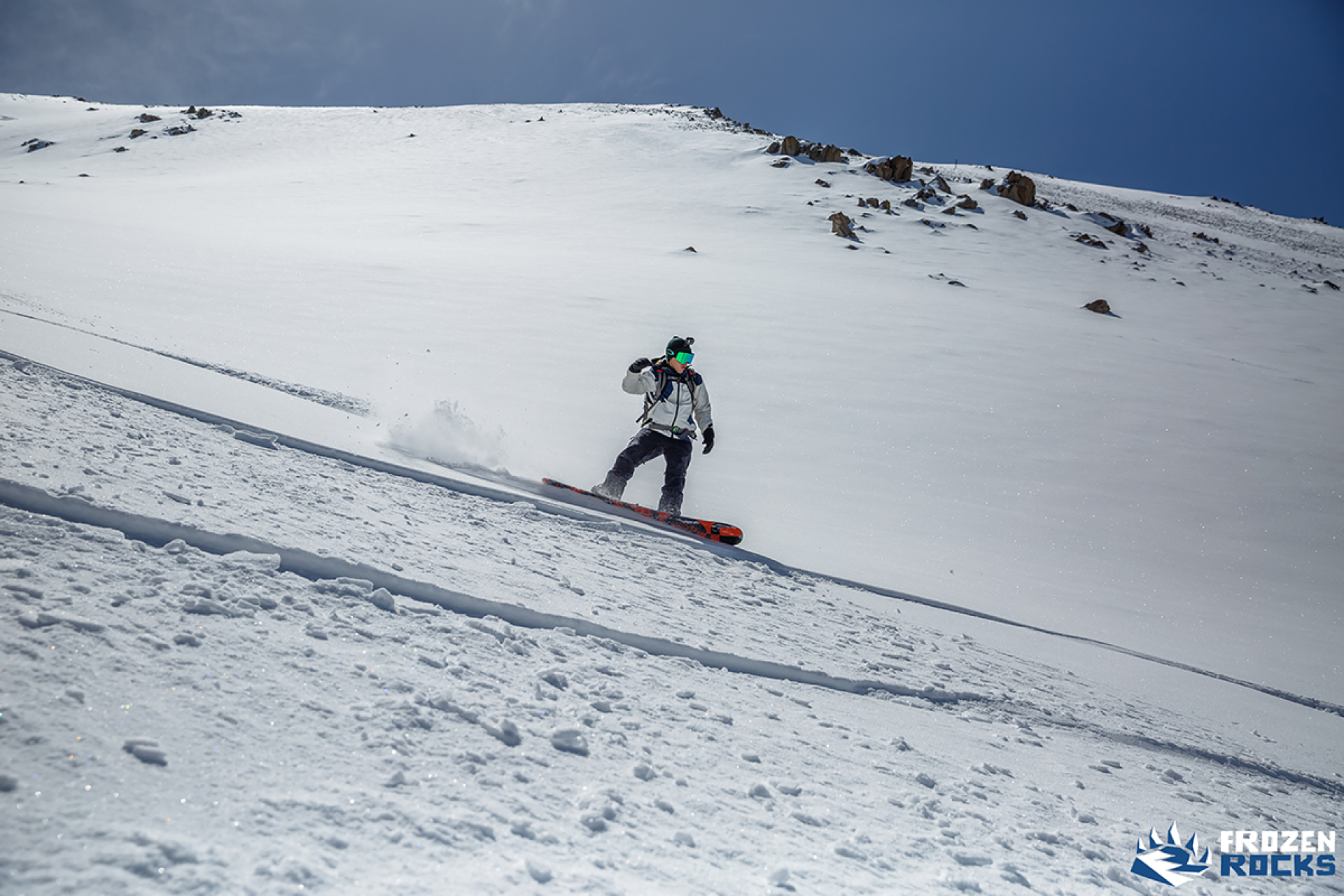 snowboarder on Tourist peak Cosmostation Almaty