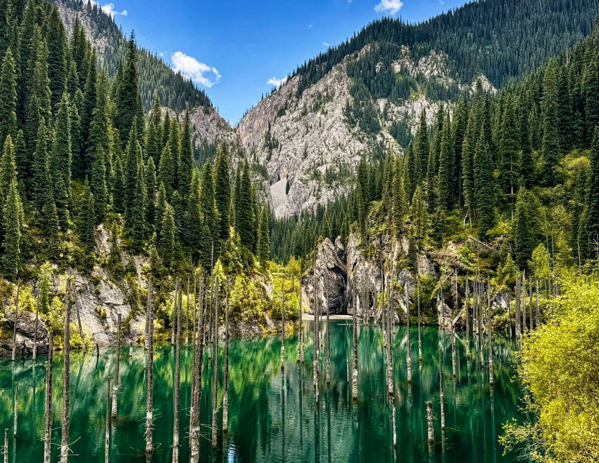 trekking and horse-riding on Kaindy lake in Kazakhstan