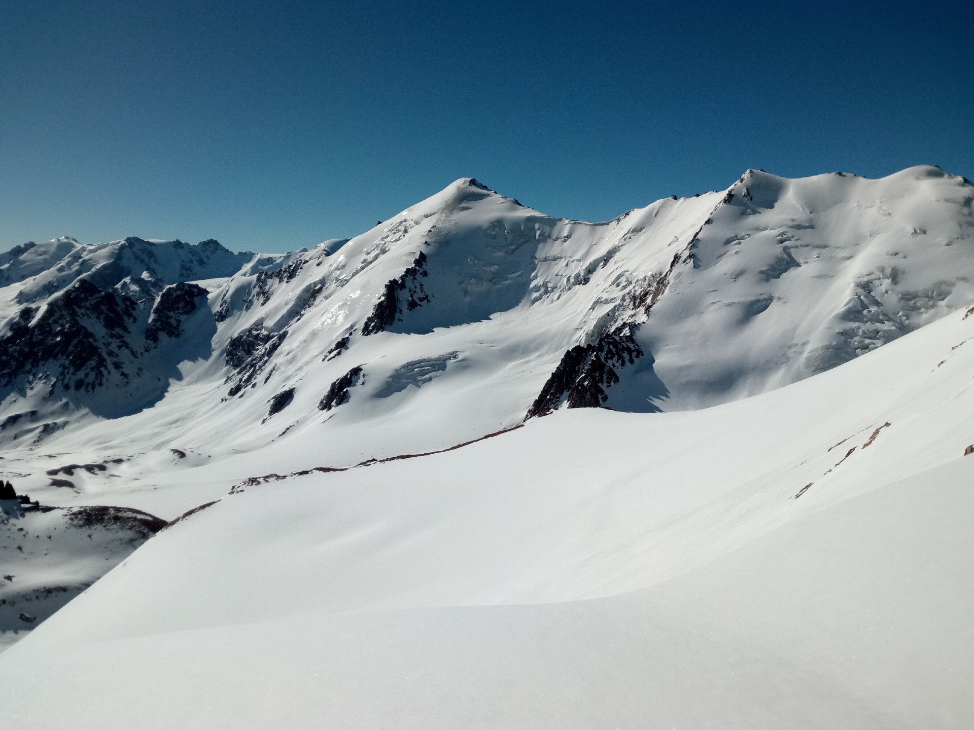 view to SGU peak and Soviet Alpinists peak from Tuyuksu pass