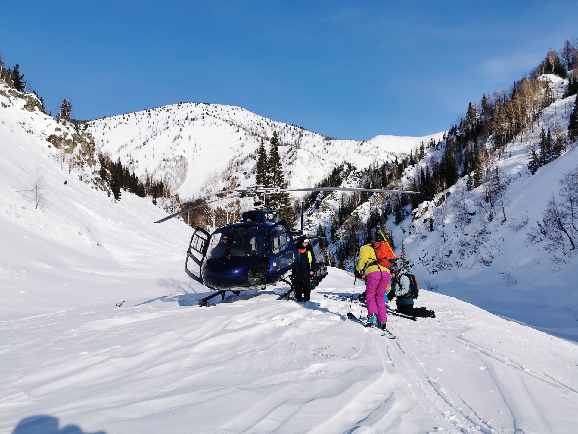 helicopter and the skiers Altai mountains kazakhstan